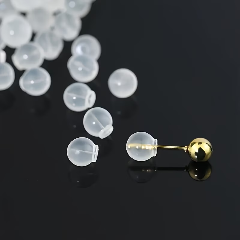 Body Jewelry Top - 100 قطعة من سدادات الأقراط الشفافة